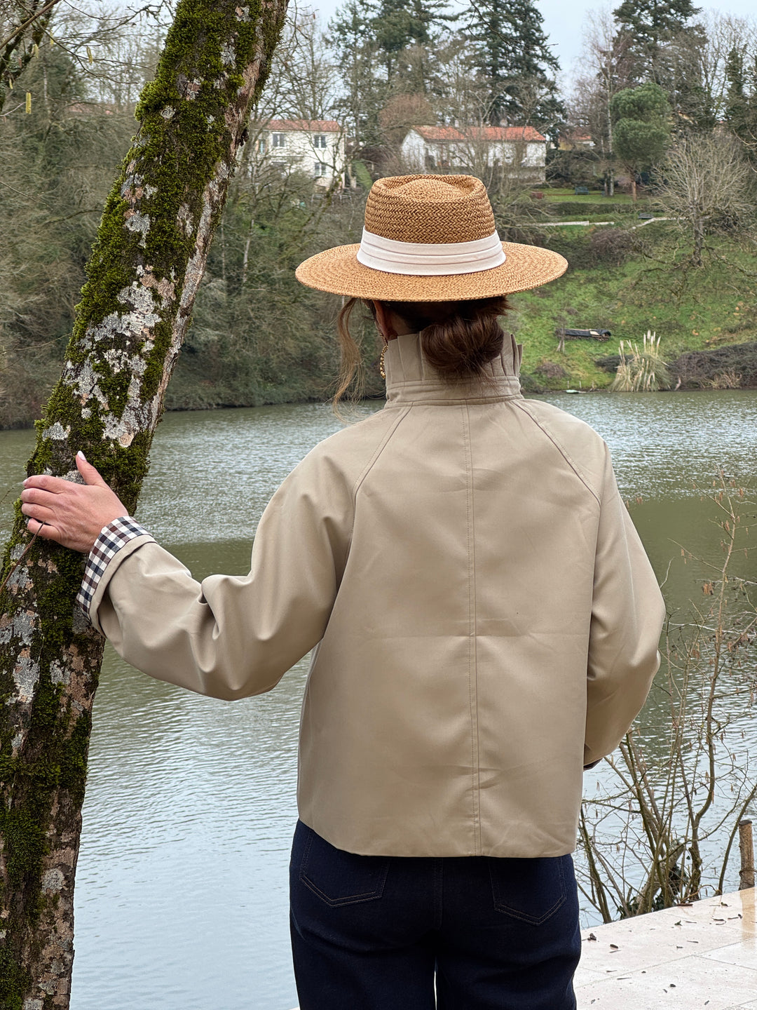 Short beige trench coat with stand-up collar and navy and chocolate gingham detailing OLIVIA