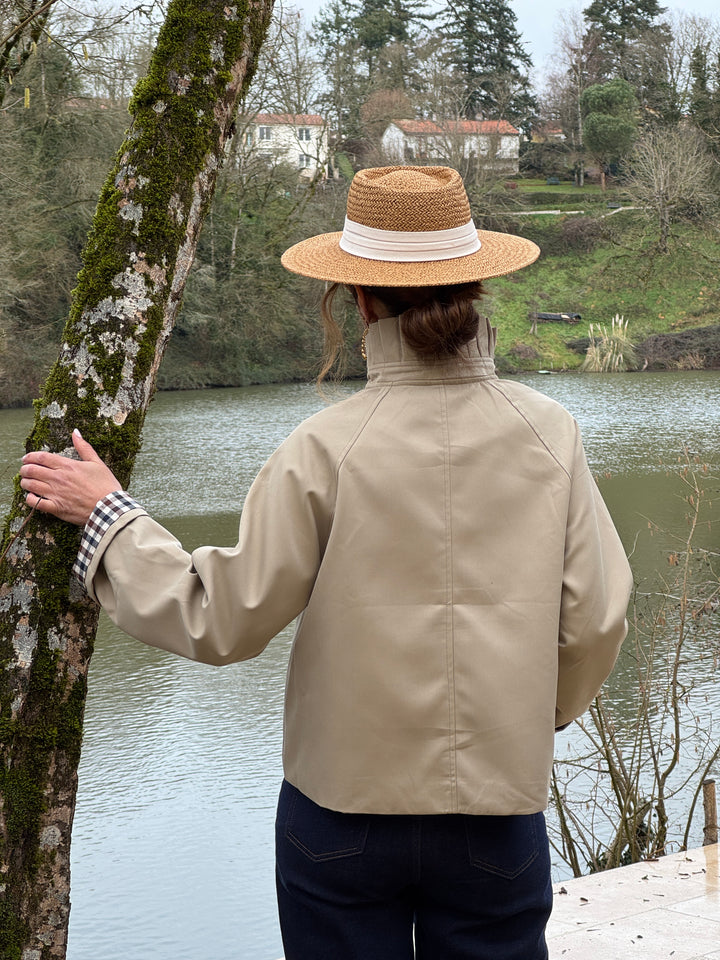 Short beige trench coat with stand-up collar and navy and chocolate gingham detailing OLIVIA
