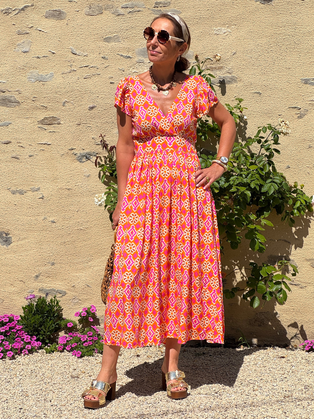 Robe imprimé fuchsia, bronze et beige fond orange ODON In April 1986