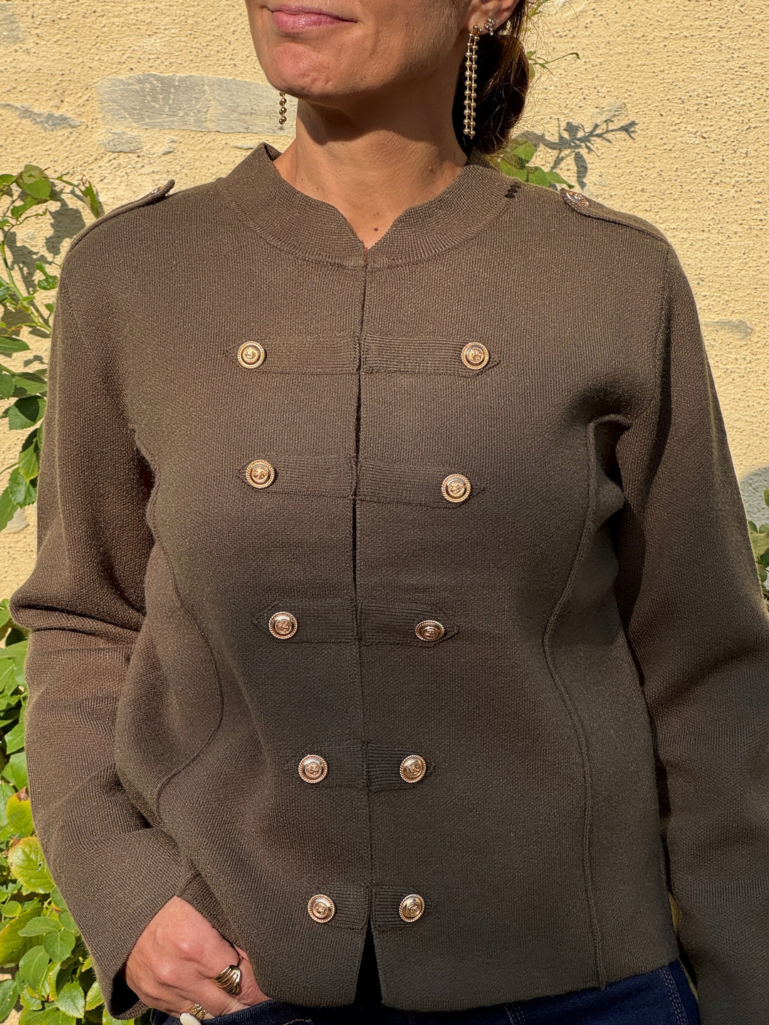 Veste kaki en maille officier NINO In April 1986