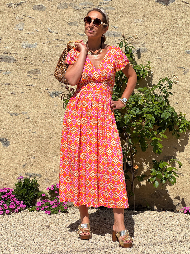 Robe imprimé fuchsia, bronze et beige fond orange ODON In April 1986