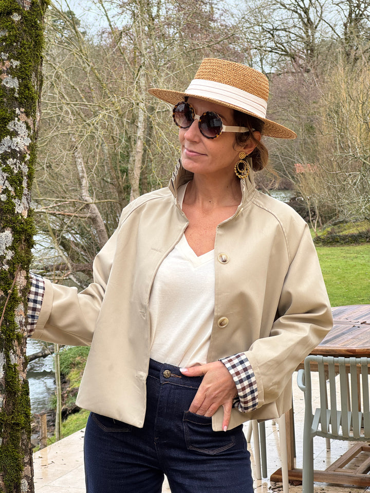 Short beige trench coat with stand-up collar and navy and chocolate gingham detailing OLIVIA