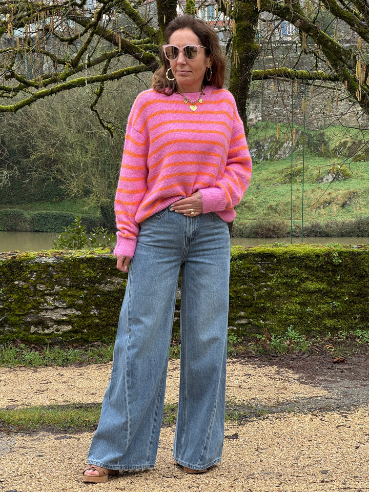 Orange striped sweater with a pink background, CHERRY