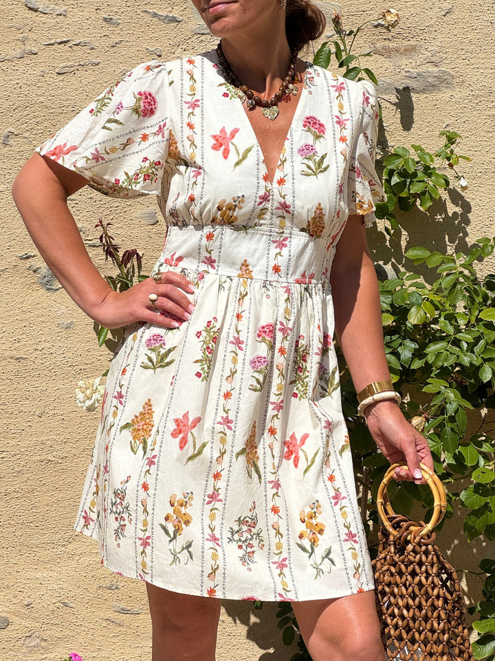 Robe imprimé floral rose et vert fond beige SOUHEILA In April 1986
