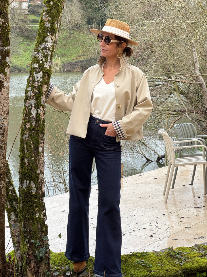 Short beige trench coat with stand-up collar and navy and chocolate gingham detailing OLIVIA