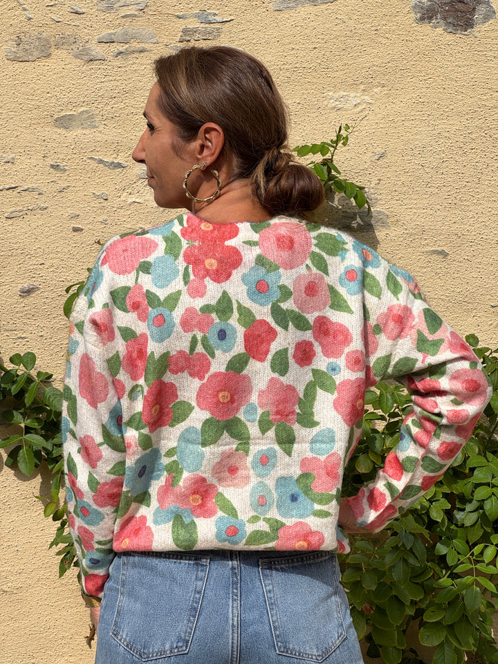 LIOR floral sweater in pink, yellow and sky blue on a beige background In April 1986