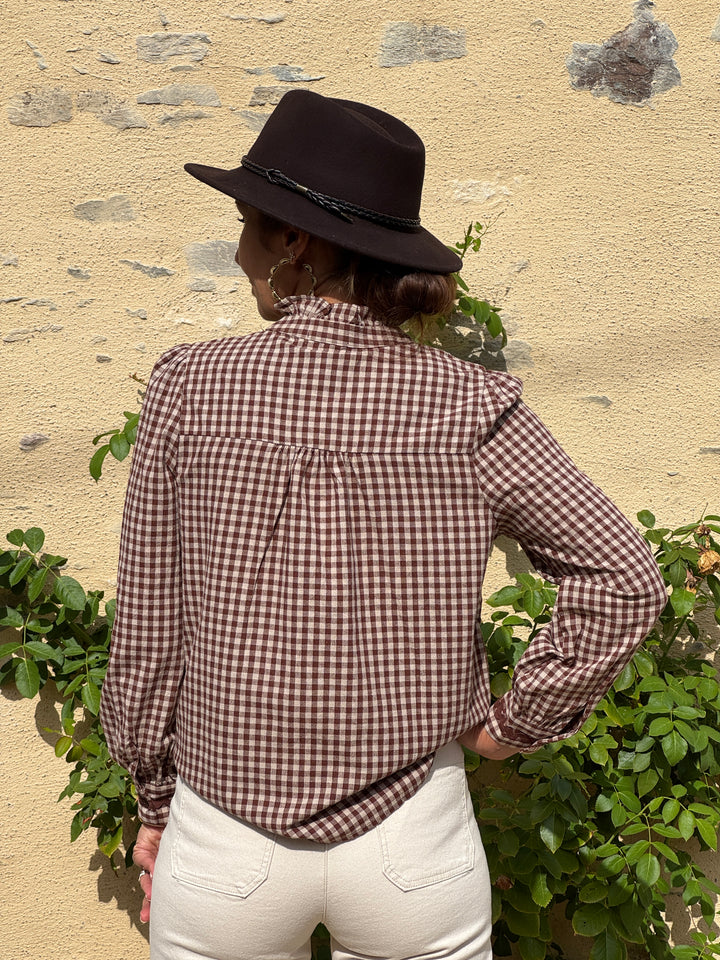 ANSELIN Brown Shirt In April 1986