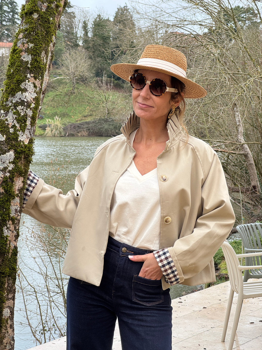 Short beige trench coat with stand-up collar and navy and chocolate gingham detailing OLIVIA