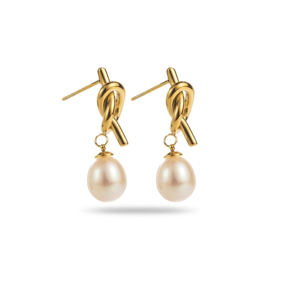 Boucles d’oreilles dorées avec nœud stylisé et perle blanche nacrée, bijoux élégants 2,5 cm