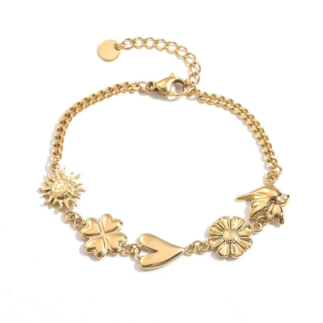 Bracelet doré en chaîne fine avec charms soleil, trèfle, cœur, fleur et oiseau en acier inoxydable