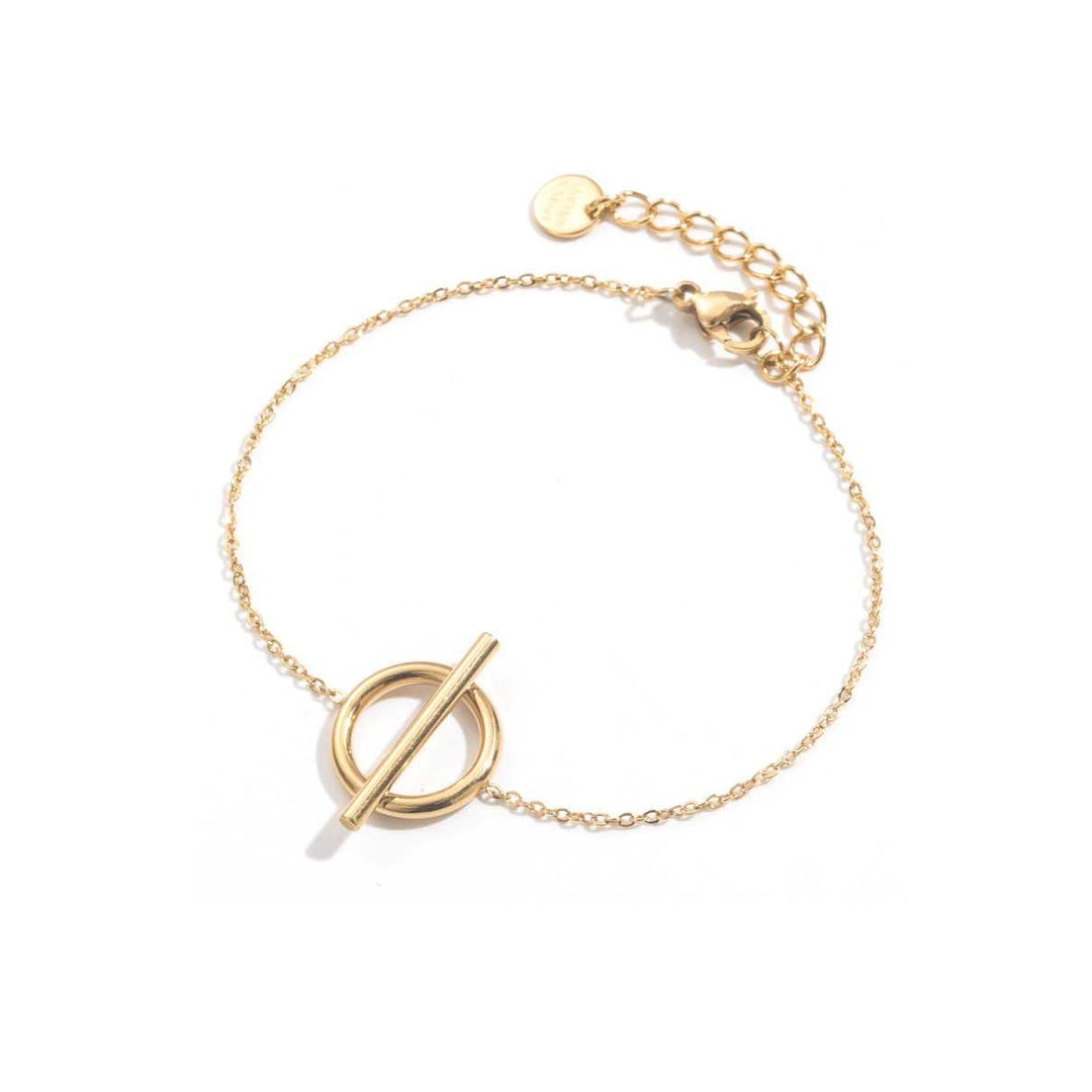 Bracelet doré avec anneau barré en acier inoxydable maille fine réglable
