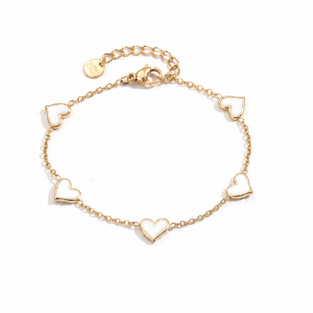 Bracelet doré en acier inoxydable avec petits cœurs blancs, bracelet fin élégant et tendance pour femme.
