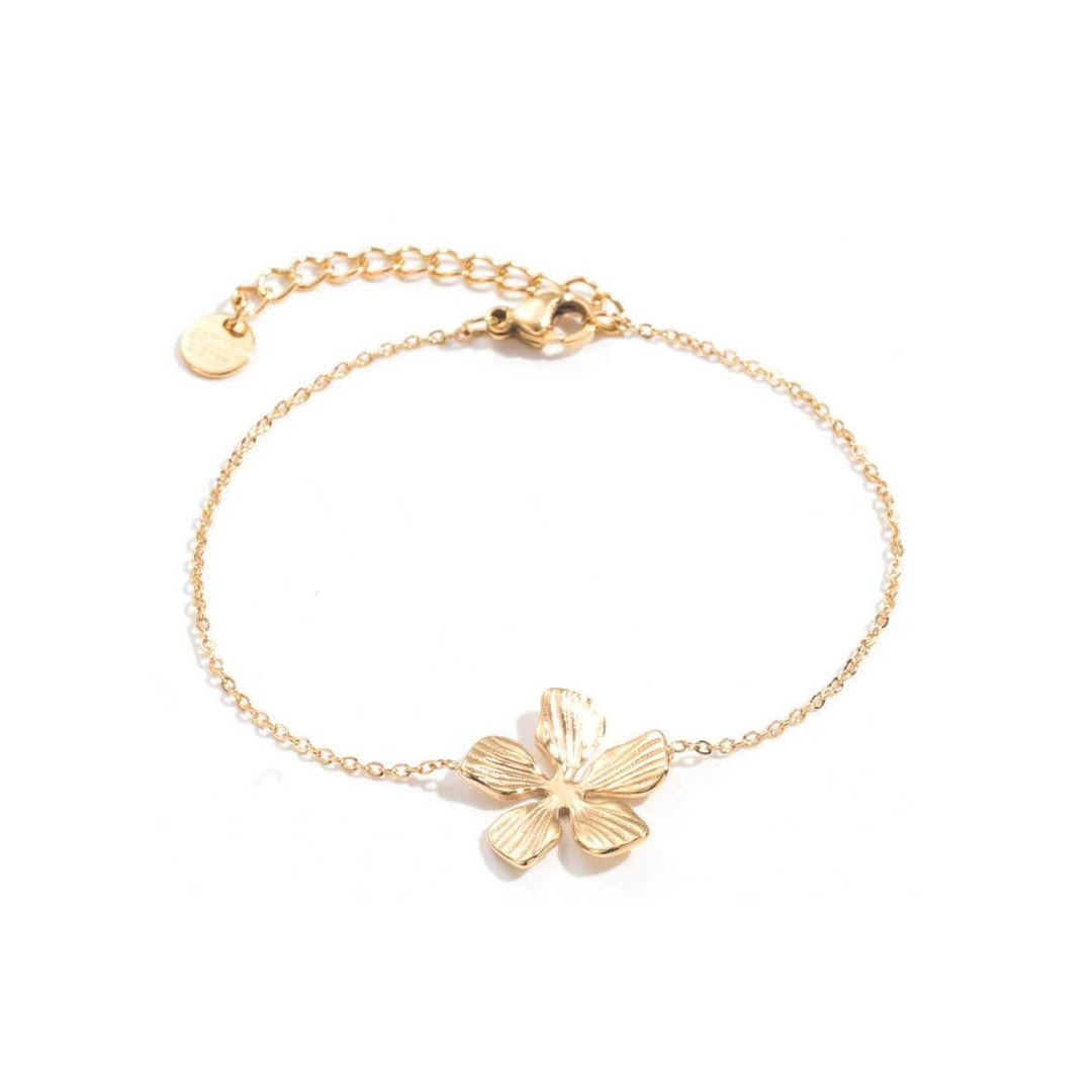 Bracelet doré avec fleur centrale en acier inoxydable maille fine réglable