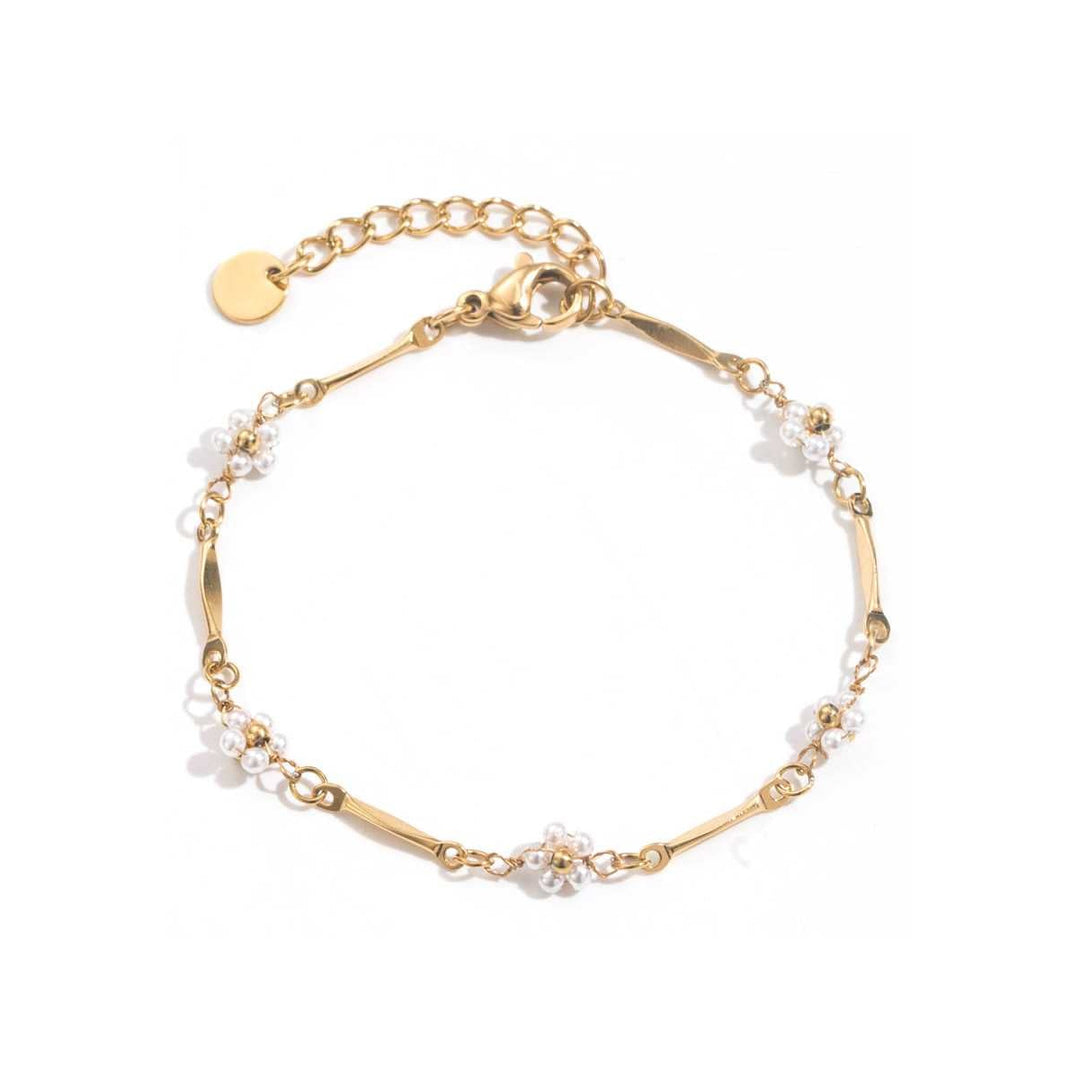 Bracelet doré fleurs nacrées avec perle centrale et maille fine réglable en acier inoxydable