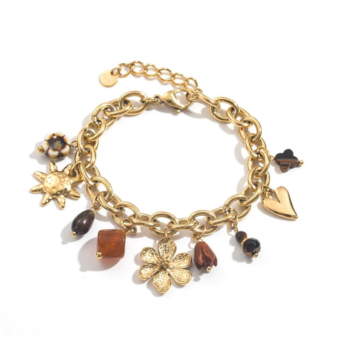 Bracelet doré à maillons épais avec breloques fleurs marron et charms dorés en acier inoxydable