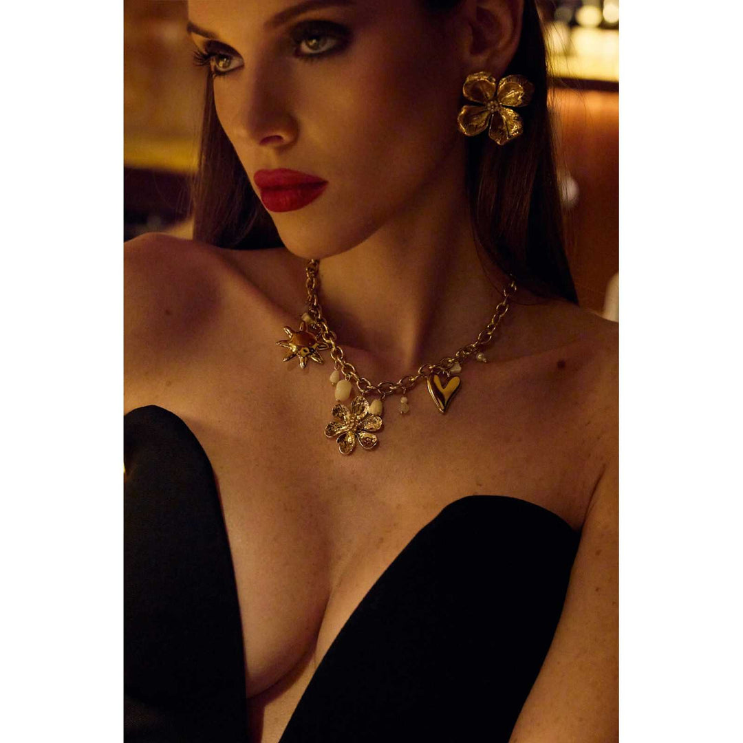 Gold and white stainless steel necklace with charms